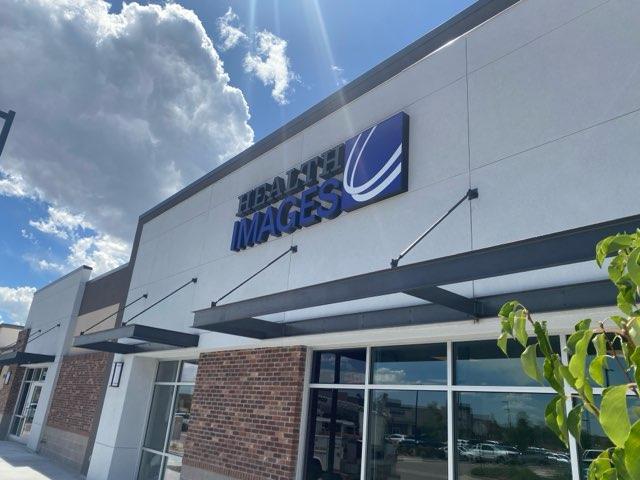 Storefront sign for a Health Images radiology center in Westminster, Colorado.